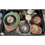 A group of Prattware pot lids framed and with bases, including Uncle Toby, Country Quarters,