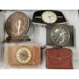 Four mantle clocks, including Smiths, Metamec etc., and a box Brownie camera