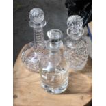 Three cut glass decanters, with stoppers, 27cm high (3)