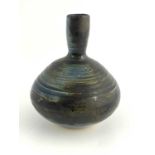 Rakusai Onishi, an Akahada vase, bulbous form, mottled iron over blue glaze, in signed wooden box,