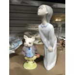 A Lladro figurine of a girl leaning on her knee, 18cm high, and a Royal Albert Beatrix Potter figure