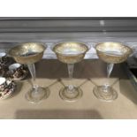 A set of three Venetian Salviati champagne glasses, the bowl with gilded acanthus scroll and