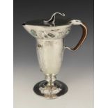 Liberty & Co., Cymric, An early Edwardian silver Arts and Crafts jug, with tapering cylindrical body