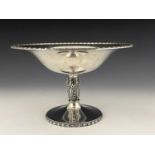 An Elizabeth II silver tazza, modelled in the Arts & Crafts style, the flared circular bowl atop a