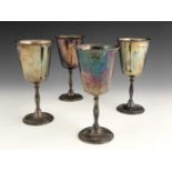 A set of four Elizabeth II silver goblets, each with baluster stem atop of spreading circular