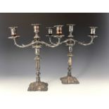 A pair of Victorian plated three-light candelabra, modelled in the late eighteenth-century style,