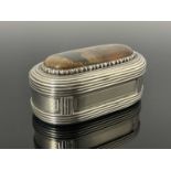 A George IV silver snuff box, of ovoid form, the cover inset with a polished cabochon specimen agate