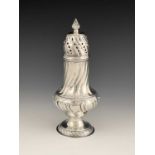 A Victorian silver caster, of baluster form, the body with wrythen decoration, the pierced