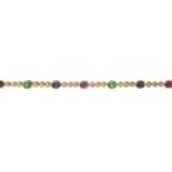 An 18ct gold ruby, emerald, sapphire and diamond line bracelet