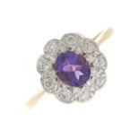 An early 20th century 18ct gold amethyst and diamond cluster ring