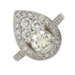 A platinum and diamond cluster dress ring