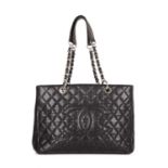 Chanel, a Grand Shopping Tote, crafted from grained black caviar leather with maker's classic