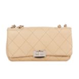 Chanel, a nude Single Flap handbag, featuring polished silver-tone hardware, a rear patch pocket,