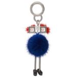 Fendi, a monster fox fur bag charm, crafted from polished silver-tone hardware, with blue and orange