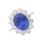 An 18ct gold tanzanite and diamond cluster ring