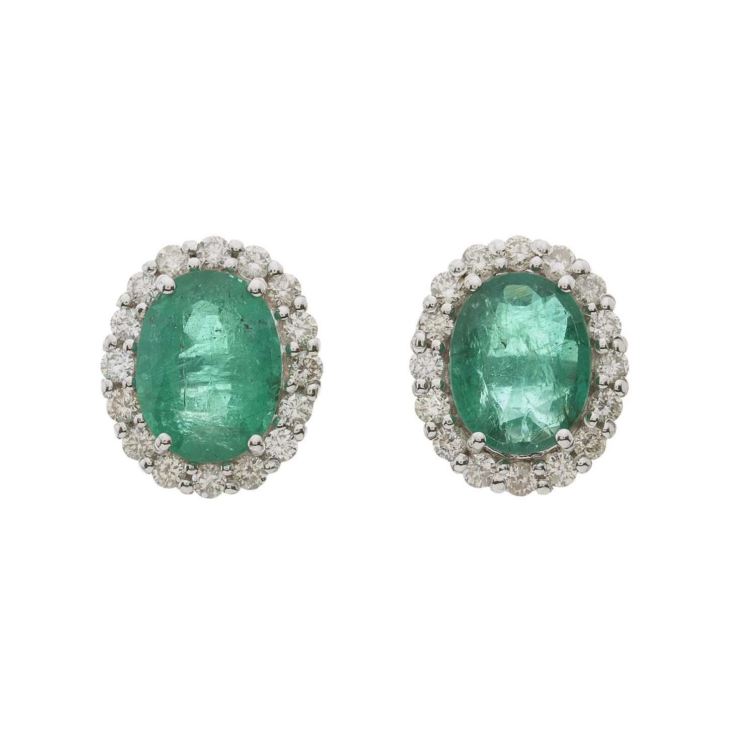 A pair of 18ct gold emerald and diamond cluster stud earrings
