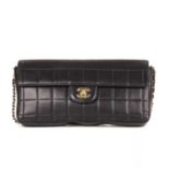 Chanel, a Chocolate Bar handbag, featuring a square quilted black leather exterior, with 24k