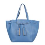 Celine, a Phantom Tassel tote, crafted from blue calf leather, featuring dual leather handles,