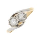 An 18ct gold old-cut diamond two-stone crossover ring