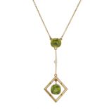 An Edwardian 15ct gold peridot and pearl pendant, with chain