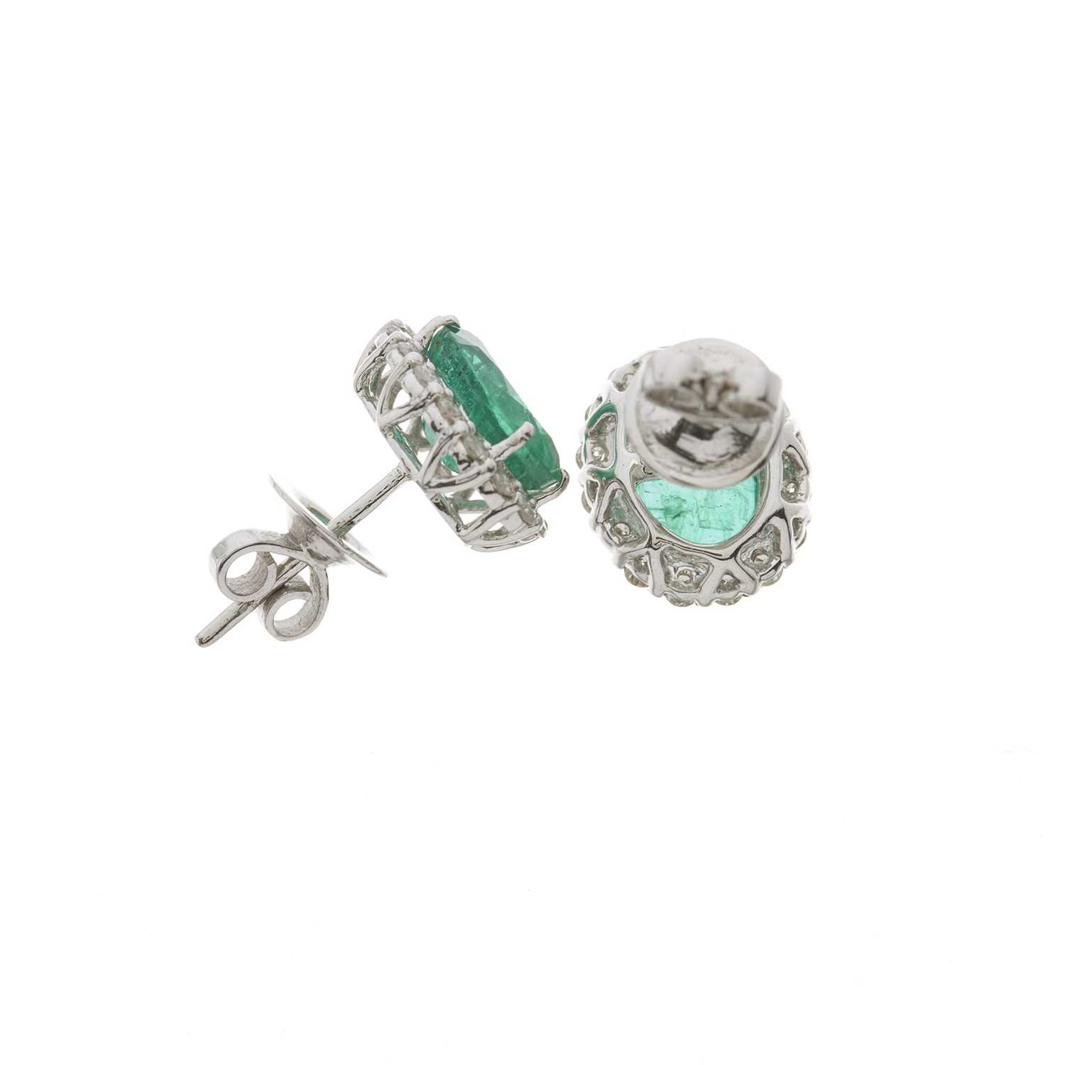 A pair of 18ct gold emerald and diamond cluster stud earrings - Image 2 of 2