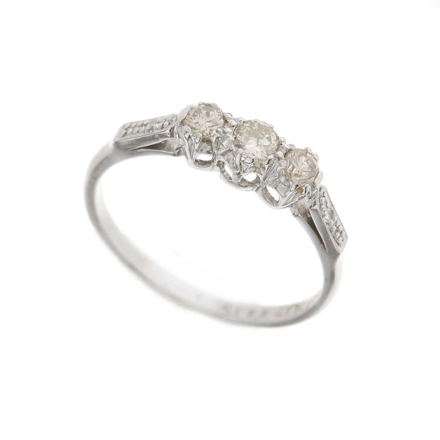 A mid 20th century 18ct gold and platinum, diamond three-stone ring - Image 2 of 3