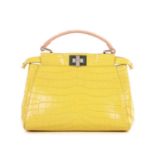 Fendi, small crocodile Peekaboo handbag, crafted from luxurious yellow crocodile skin, featuring a