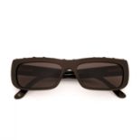Chanel, a pair of sunglasses, designed with brown acetate frames, brown tinted lenses, and gold-tone