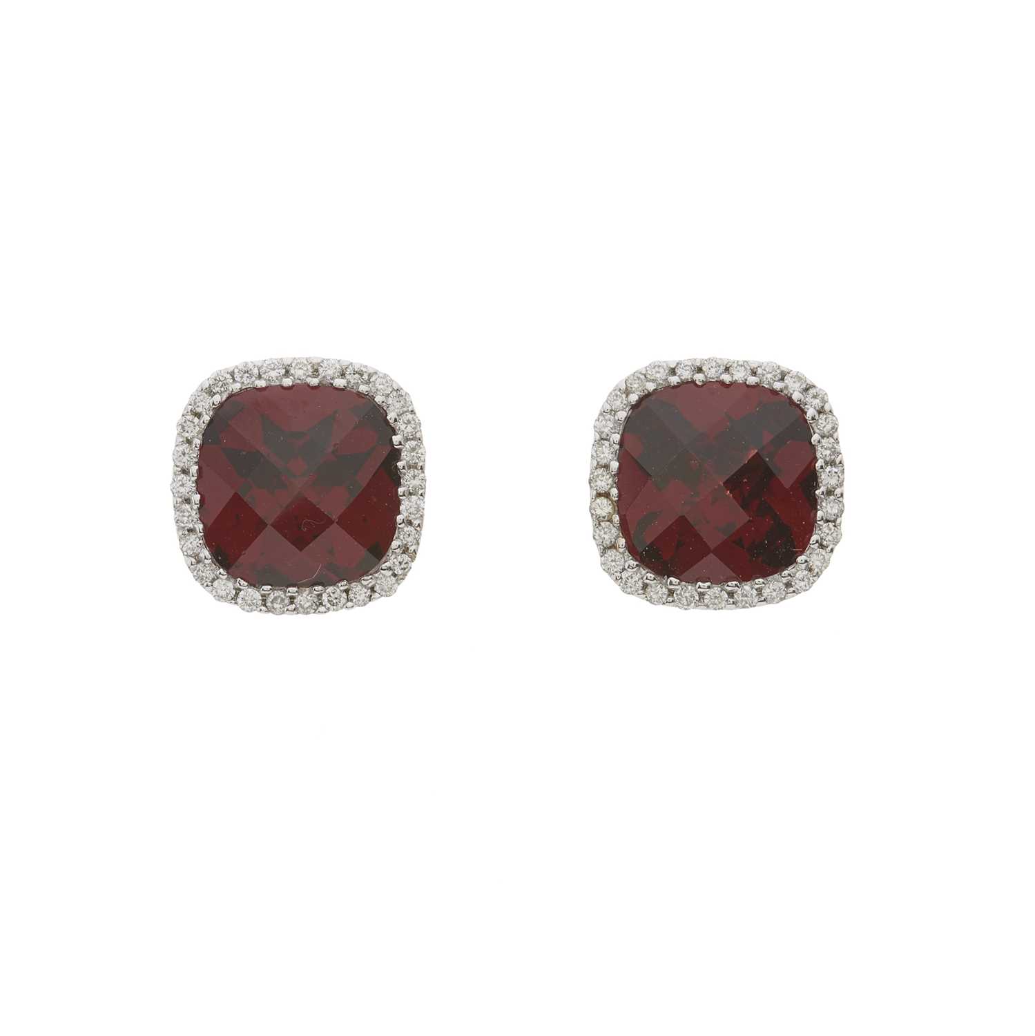 A pair of 18ct gold garnet and diamond cluster stud earrings