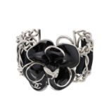 Chanel, an enamel Camellia flower chain-link bracelet, the silver-tone metal and black enamel