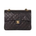 Chanel, a vintage Classic Tall Double Flap handbag, designed with a black diamond quilted lambskin