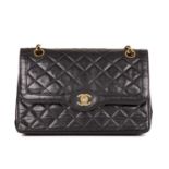 Chanel, a vintage Paris Double Flap handbag, designed with a diamond quilted black lambskin