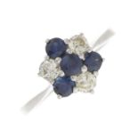 A mid 20th century sapphire and diamond cluster ring