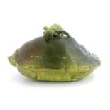 An art pottery turtle soup tureen, circa 1880, green faience glazed earthenware, modelled as a
