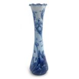 William Moorcroft for James MacIntyre, a Florian Violet vase, circa 1899, waisted baluster form with