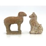 Two Chinese terracotta tomb figures, probably Tang, including a ram and a dog, 11.5cm high (2)