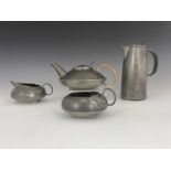Archibald Knox for Liberty and Co., a Tudric Arts and Crafts pewter four piece tea set, model