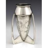 Archibald Knox for Liberty and Co., a Tudric Arts and Crafts pewter bomb vase, 0226, plain form on