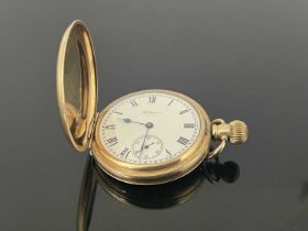 A Waltham gold plated hunter pocket watch, white enamelled dial with subsidiary seconds dial, 5cm