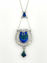 Charles Horner, an Arts and Crafts silver and enamelled pendant, Chester 1911, open shield form with