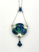 Charles Horner, an Arts and Craft silver and enamelled pendant, Chester 1911, the rounded plaque