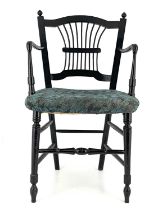 Dante Gabriel Rossetti for Morris and Co., an Arts and Crafts ebonised Sussex armchair, designed