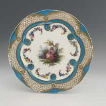 A Continental porcelain plate, circa 1820, circular form, painted witha lady seated on mossy bank,