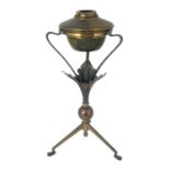 W A S Benson, an Arts and Crafts copper and brass oil lamp, model 114, circa 1900, the angled tripod