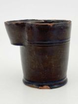 An American redware shaving mug, early 19th century, flared conical form, bowled puck holder and