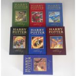 Rowling, J.K. Harry Potter, a set of seven deluxe cloth hardback edition volumes, including Harry