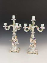 A pair of Meissen three branch/four sconce candelabra, circa 1850, after a model by Leuteritz,