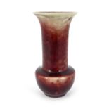 Ruskin Pottery, a High fired vase, 1922, sang de boeuf glaze, bulbous form with flared neck,