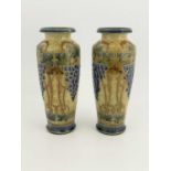 Eliza Simmance for Royal Doulton, a pair of stoneware vases. shouldered inverse baluster form,