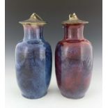 A pair of Chinese monochrome high fired vases, converted to lamp bases, purple sang de boeuf hares